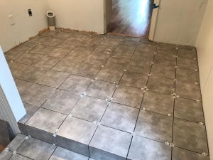 Laundry room tile floor installation in Griffin, GA