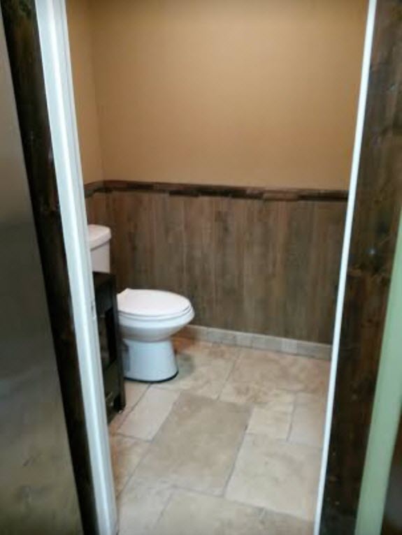Half Bath w/ Travertine Flooring, Wood Plank Walls & Wood Trim - Williamson, GA